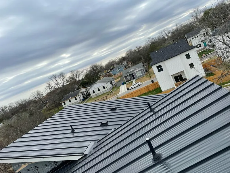 Standing seam metal roof panels with vents for Skylight Repair in Sharonville